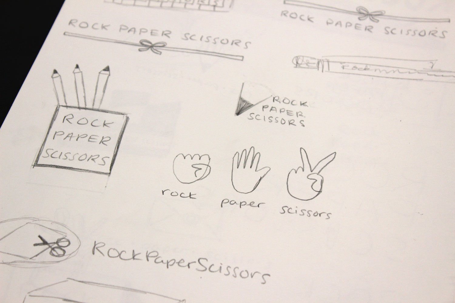 Rock Paper Scissors combination logo sketches