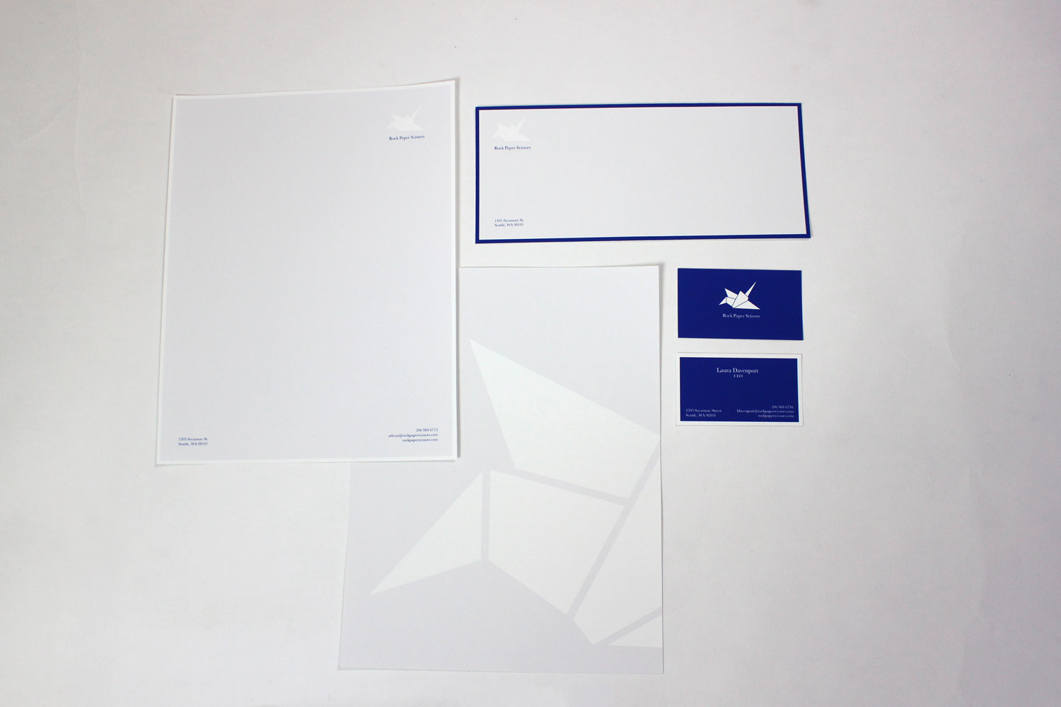 Letterhead, envelope, and business cards for Rock Paper Scissors, designed by Chloe Atchue-Mamlet